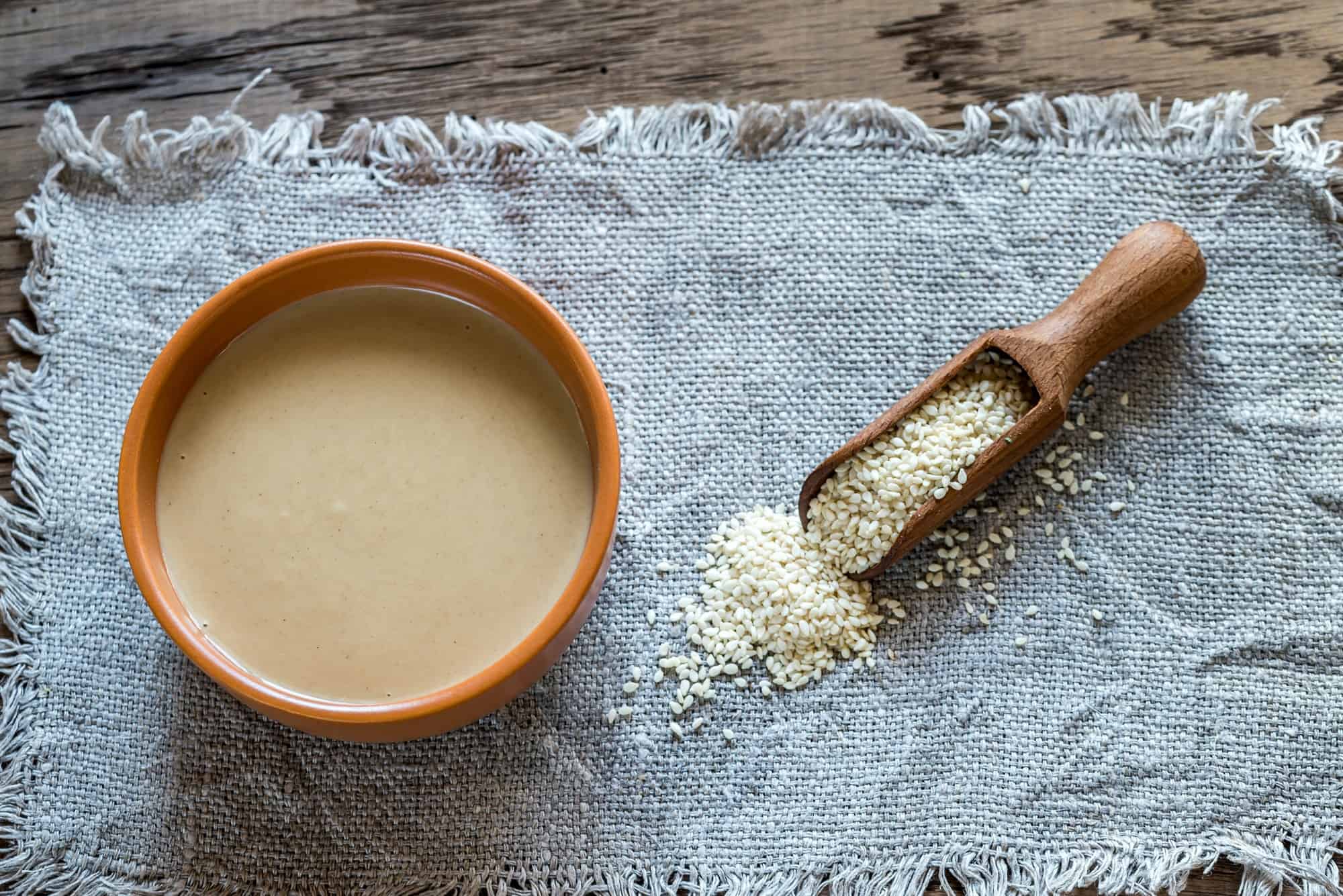 Bowl of tahini with sesame seeds