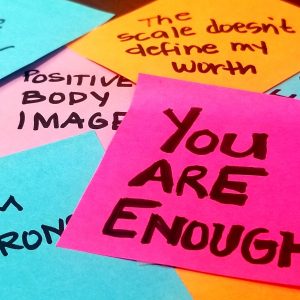 Brightly Colored Post It Notes With Positive Affirmations.